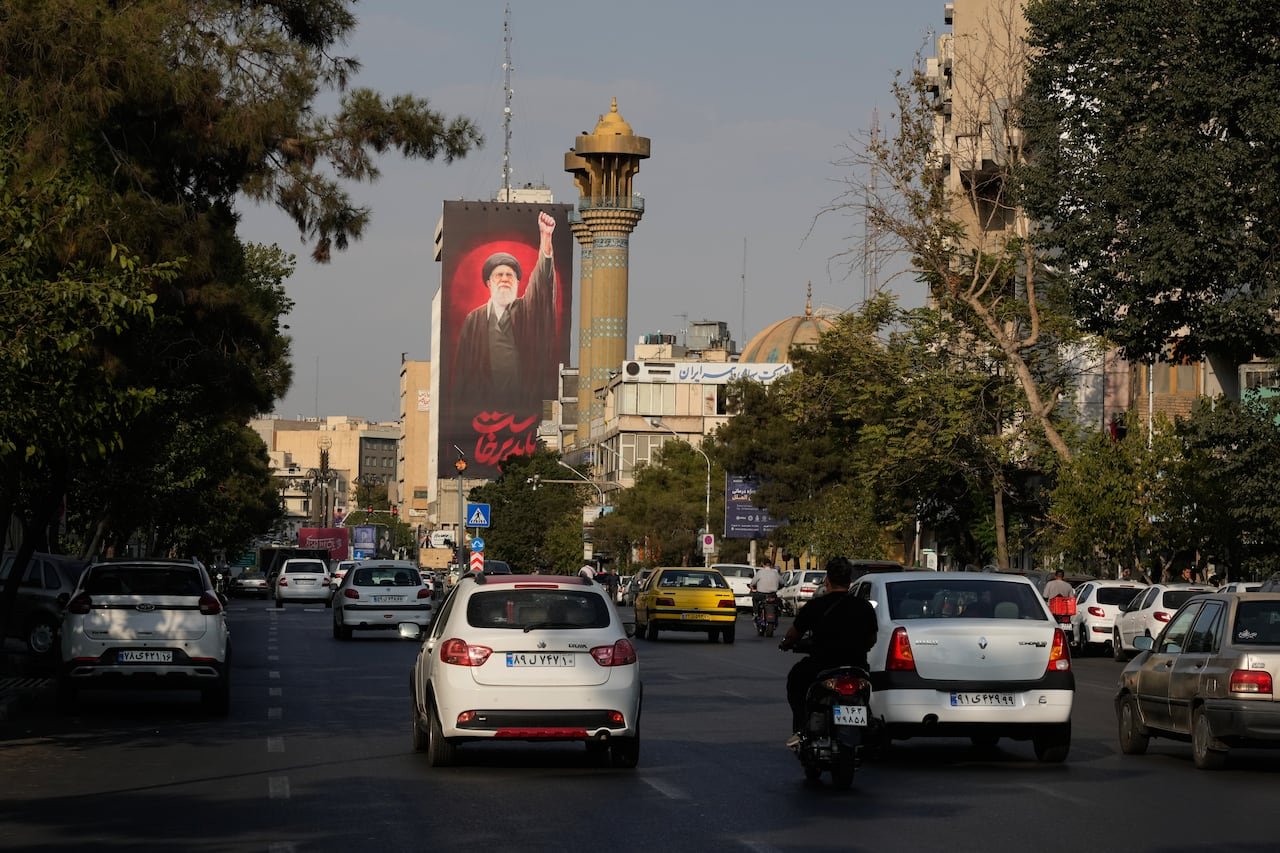 default-346 A billboard, seen in Tehran, reading in Farsi: "We must rise up."
